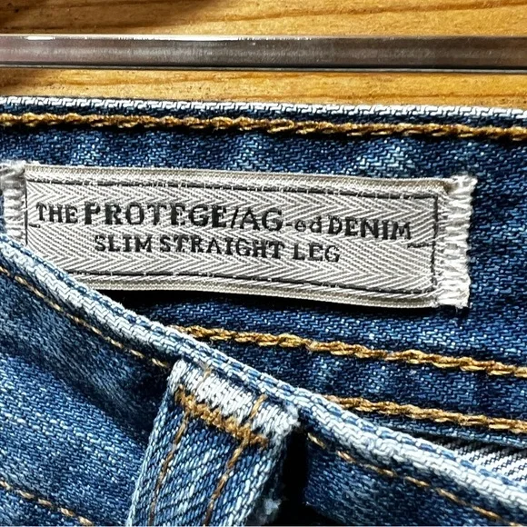 Adriano Goldschmied AG Men’s “The Protégé” JeansDistressed Slim Straight Leg